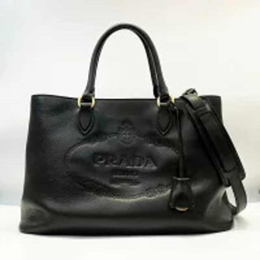 Prada handbag black leather tote bag embossed logo